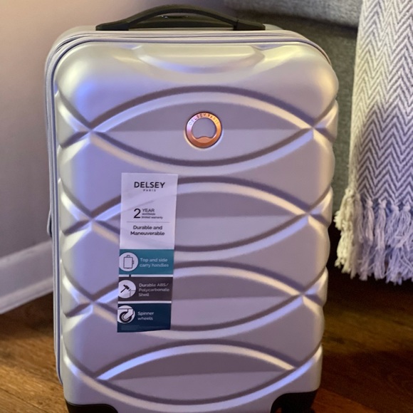 Delsey Bags Silver Carry On Luggage Poshmark